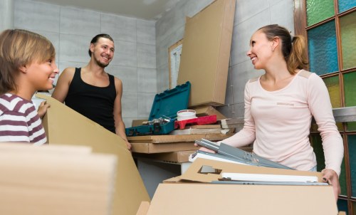Packing boxes and household items in a Brixton flat