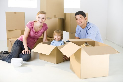 Removal van and movers handling a same-day move in Brixton street