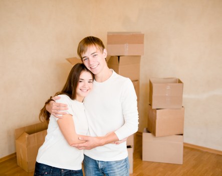 Removal team working on a Brixton residential move with packed boxes