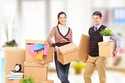 Packed office furniture and equipment ready for local relocation