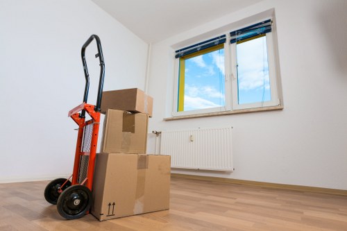 Packed boxes and household items prepared for local moving in Brixton
