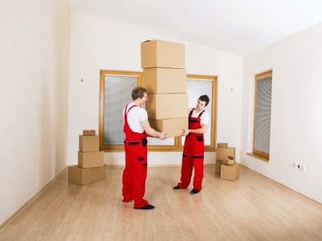 Careful furniture handling during a move in Brixton