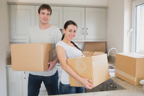 Careful transport of sofas and tables during a Brixton removal job